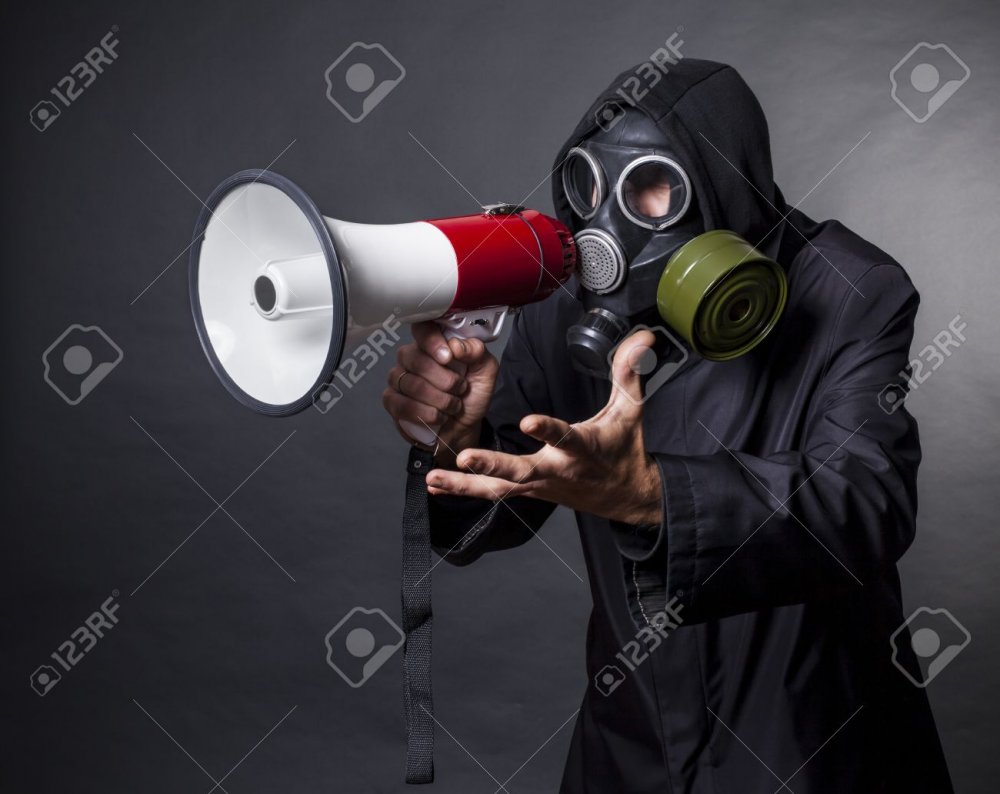 15896920-a-man-in-a-gas-mask-with-a-megaphone-calling-for-help.thumb.jpg.2054baf6b3ca772e5cab30e75431d3fa.jpg