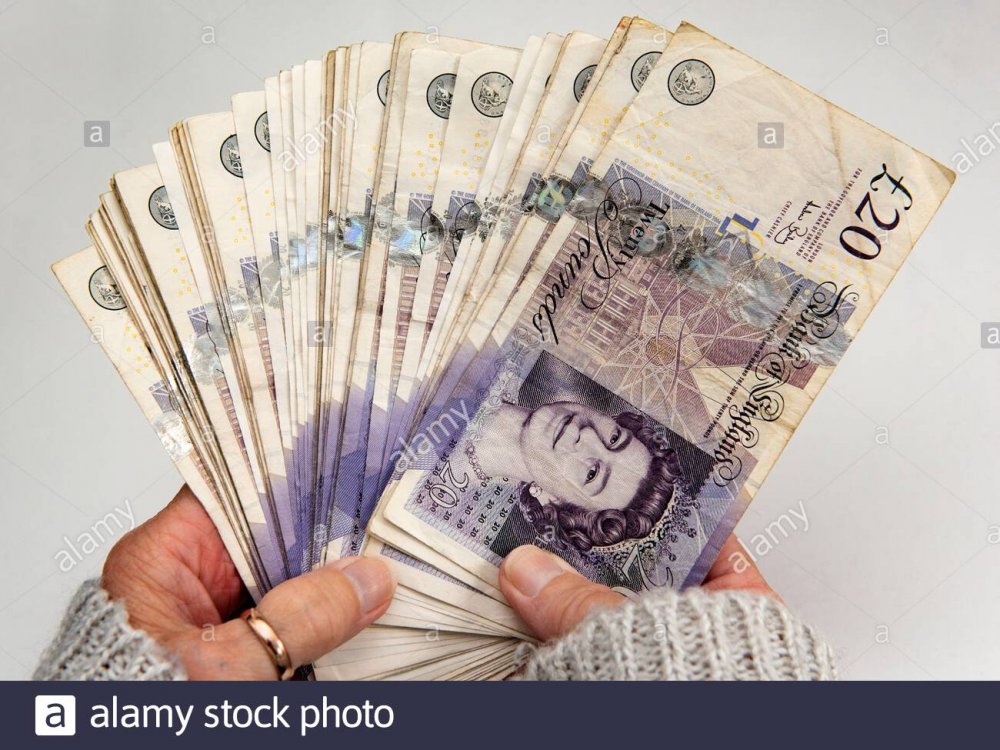 womans-hands-holding-a-wad-of-twenty-pound-notes-2BMA2K3.thumb.jpg.fab5cb280cd70b0c45c47fe22d4d7b71.jpg