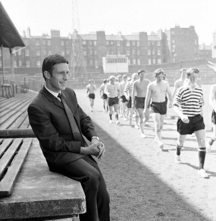 Roald Jensen watches as his team mates train at Tynecastle.jpg